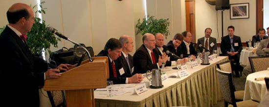 Auto-industry executives and MIT researchers grapple with issues of connectivity, distraction, security while driving. Photography and audio from the event inside. 