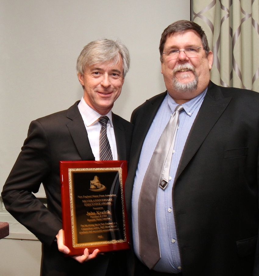 John Krafcik, President & CEO, Hyundai Motor America, accepts THE SILVER ANNIVERSARY EXECUTIVE AWARD from NEMPA President Keith Griffin. Krafcik was cited for “his strong ties to New England as a Connecticut native, MIT Sloan School graduate, and for his sterling success in the automotive industry.” Krafcik also accepted THE YANKEE CUP TECHNOLOGY AWARD for his company’s Hyundai Gasoline Direct Injection. Previously a premium/luxury feature, Hyundai took the bold step of bringing Gasoline Direct Injection technology to nearly its entire fleet, from the sub-compact Accent all the way to its flagship Equus. GDI allows Hyundai vehicles to maximize fuel efficiency and reduce emissions. Selected in conjunction with faculty and staff at MIT, NEMPA’s Yankee Cup annually goes to an automotive feature or system that significantly enhances the motoring experience, whether by making driving safer, more cost- efficient or simply more enjoyable. 