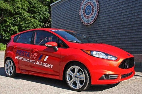 The Fiesta ST also gets a unique interior, with special pedals and shifter along with darker materials on the pillars and headliner. But the most obvious ST tipoff will be colors such as Tangerine Scream, Race Red, Performance Blue, Green Envy and this Molten Orange Metallic.