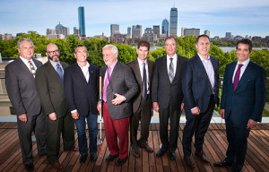 Tech Conference VIPs on the MIT Media Lab 6th-floor deck, overlooking the Charles River and the Boston skyline. From left: John Paul, NEMPA; Craig Fitzgerald, NEMPA; Danny Shapiro, NVIDIA; Paul Parravano, MIT; Bryan Reimer, MIT; John Capp, GM; Jeff Ruel, Autoliv; John Bozzella, Global Automakers