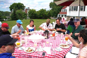 This year it was outdoor seating overlooking the harbor entrance and with a sea breeze to keep everyone comfortable.