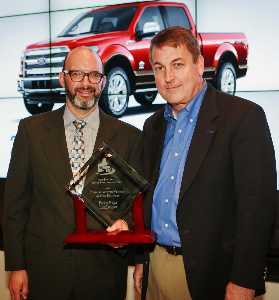 The Ford F-150 with EcoBoost received the award as NEMPA’s Official Winter Vehicle of New England at an evening dinner following the technology conference. Chris Brewer (right), chief program engineer for the F-150 and an MIT grad, accepted the award.