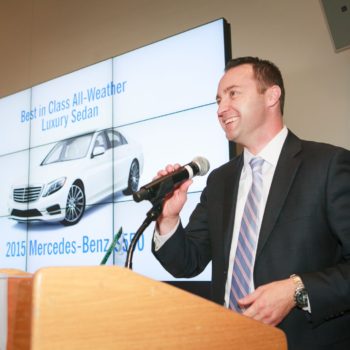 Rob Moran, Director, Corporate Communications for 
Mercedes-Benz cheerfully accepts the award for the "Best in Class all-weather Luxury Sedan" -
Mercedes Benz S550