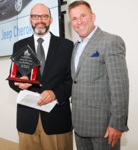 Tom Shanley, Director, FCA Northeast Business Center, accepting the award for Jeep from NEMPA President, Craig Fitzgerald.